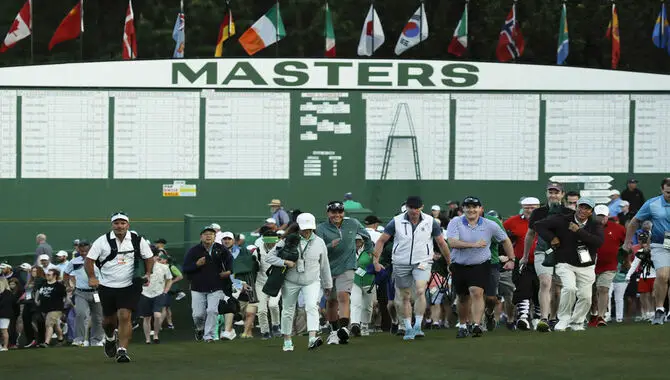 Golf patrons enter Augusta National for the first round of play of the 2019 Master golf tournament at the Augusta National Golf Club in Augusta, Georgia, U.S.